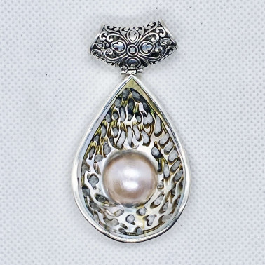 PD 14665 A-PL-(UNIQUE 925 BALI SILVER PENDANT WITH HAND CARVING MABE PEARL)